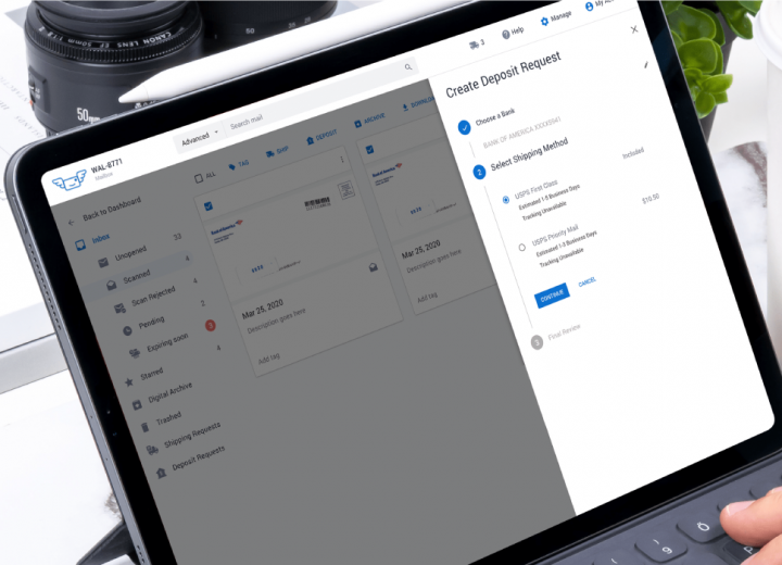 A laptop on a desk next to the Starbucks cup, desk flower and a Canon camera, displaying a "Create Deposit Request" section of an app developed for a client.